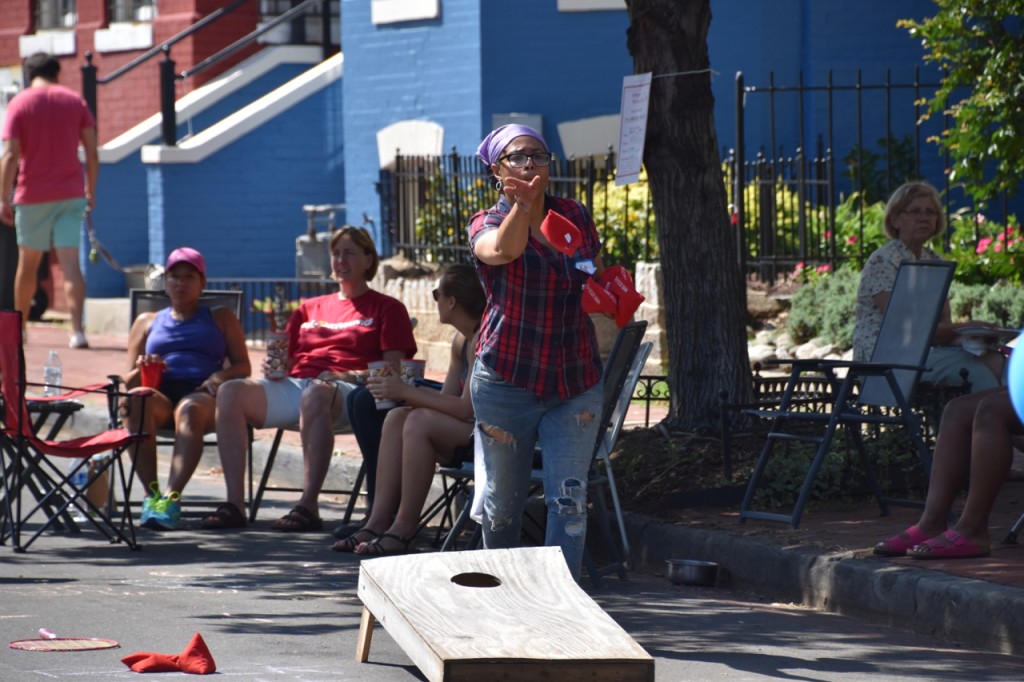 Vice President Yolanda Jones tosses a beanbag